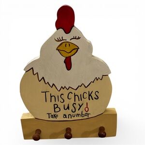 Handmade Comical Wooden Sign: “This Chicks Busy Take A Number” with 3 pegs.